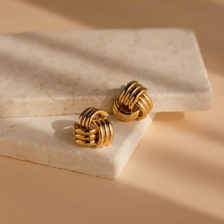 statement triple knot stud earrings