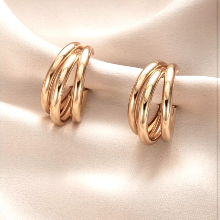 triple hoop huggie earrings color gold size shown in images